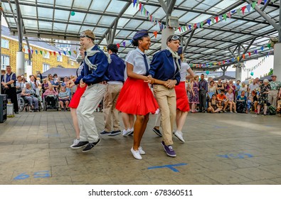 Chrisp Street, London, UK - July 16, 2017:  Dancing demonstration at the Swing East event at Chrisp Street.
