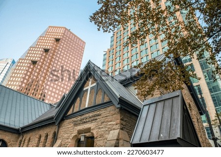 Christ Church Cathedral and surrounding skyscrapers in Vancouver, Canada.