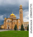Christ the Saviour Serbian Orthodox Cathedral in Banja Luka, Republika Srpska, Bosnia and Herzegovina. A Holy Trinity church built with red and yellow travertine stone and gold stainless steel domes
