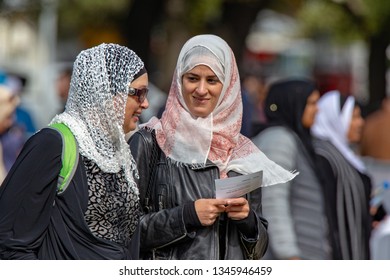 Christchurch, Canterbury, New Zealand, March 22 2019:Muslim women greet each other at the Prayer Service in Hagley Park to remember the victims and families of the Christchurch shootings one week ago