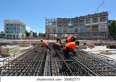 CHRISTCHURCH - DEC 07 2015:Builders Builds Rebuilding A Building In Christchurch.Over 1000 Buildings In The CBD (Central Business District) Were Demolished Following Christchurch Earthquakes