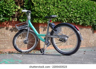 Christchurch, Dorset, UK - 09.20.2022 - An Electric Bike For Public Hire On Street In Town Of Christchurch England.    Clean Transport Option For Short Journeys. 