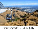 Christchurch Gondola viewed from the top of the Port Hills. In the background is the city of Christchurch, New Zealand.