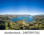 Christchurch, New Zealand: Aerial drone view of the stunning Banks Peninsula on a sunny day near Christchurch in Canterbury in New Zealand south island