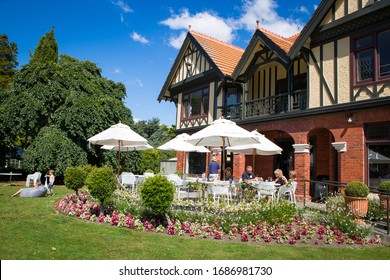 Christchurch, New Zealand, February 23 2020: Tourists In The City Enjoy The Beautiful Gardens At The Cafe In Mona Vale On A Summer Day