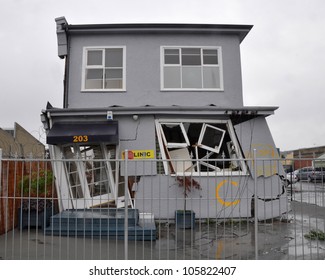 CHRISTCHURCH, NEW ZEALAND - MARCH 20: A House In The East Of The City Leans Precariously On March 10, 2011 After A Huge Earthquake In Christchurch.