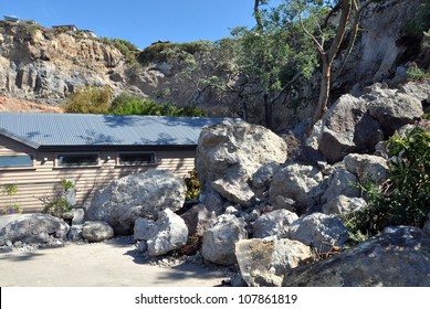 CHRISTCHURCH, NEW ZEALAND - MARCH 25: House Escapes Hundreds Of Tons Of Earthquake Rocks That Fell From The Cliffs At Redcliffs On March 25, 2011 In Christchurch. Houses On The Ridge Uninhabitable.