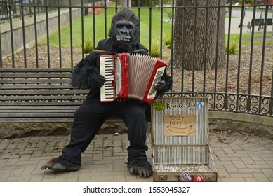 CHRISTCHURCH, NEW ZEALAND, OCTOBER 12, 2019: A Man Dressed In A Gorilla Suit Uses His Busking Skills Outside Christchurch Museum