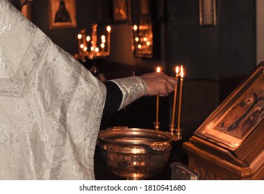 Christening  Baby  In The Church By Priest, Holy Water 