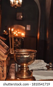 Christening  Baby  In The Church By Priest, Holy Water 