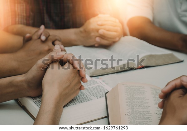 Christian Bible Study Concepts Christian\
followers are studying the word of God in\
churches.