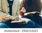 Christian Bible Study Concepts. Christian friends read and study the bible together in the park. followers are studying the word of God in churches. sharing the gospel with a friend. Education