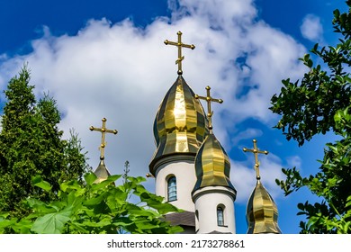 Christian church cross in high steeple tower for prayer, photography consisting of beautiful church with cross on steeple tower to sincere prayer, cross steeple tower is church prayer over clear sky