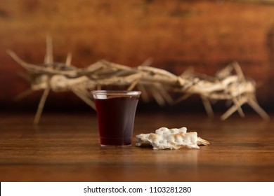 Christian Communion on a Wooden Table - Shutterstock ID 1103281280