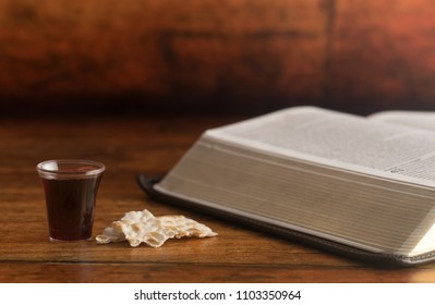 Christian Communion on a Wooden Table - Shutterstock ID 1103350964