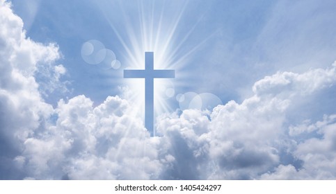 Christian cross appears bright in the sky background - Shutterstock ID 1405424297