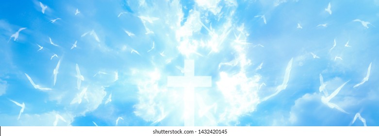 Christian cross appears bright in the sky background and soft clouds. with the light shining as Love. hope and freedom of God Jesus - Shutterstock ID 1432420145