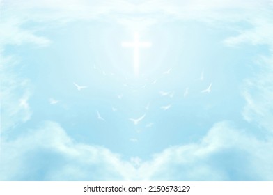 Christian cross appears bright in the sky background and soft clouds. with the light shining as Love. hope and freedom of God Jesus. - Shutterstock ID 2150673129