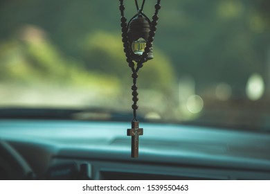 christian cross in the car background .