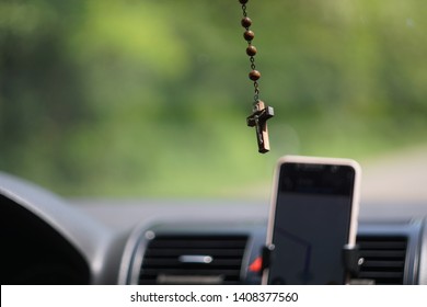 christian cross and gps navigation in car