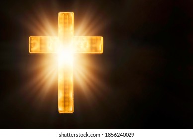 Christian Cross With Lights, Bokeh On Black Background. Copy Space. Faith Symbol. Church Worship, Salvation Concept. Faith Symbol In Jesus Christ. Holy Cross For Christmas, Easter Day. Christianity.