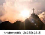 Christian cross on hill outdoors at sunrise. Resurrection of Jesus