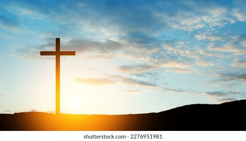 Christian cross on hill outdoors at sunrise. Resurrection of Jesus. Concept photo. - Shutterstock ID 2276951981