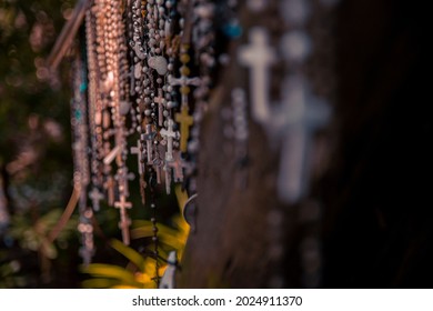 Christian Cross And Rosary Colorful Background.