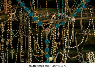 Christian Cross And Rosary Colorful Background.