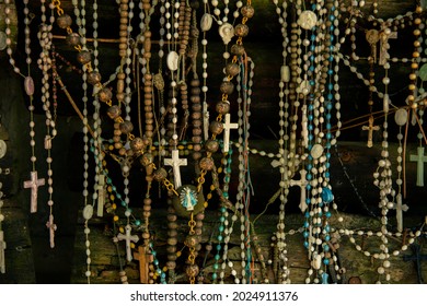 Christian Cross And Rosary Colorful Background.