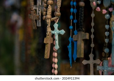 Christian Cross And Rosary Colorful Background.