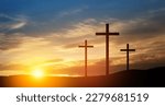 Christian crosses on hill outdoors at sunrise. Resurrection of Jesus. Concept photo.