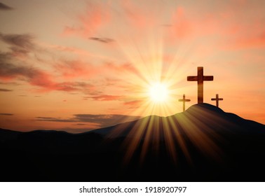 Christian crosses on hill outdoors at sunset.  Crucifixion Of Jesus