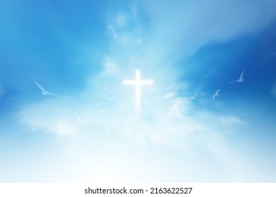 Christian faith A miracle happened on the background of the sky. A large number of fluffy clouds were separated appeared in the form of a cross in the middle of the sky. The bright and powerful ligh - Shutterstock ID 2163622527
