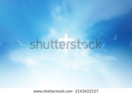 Christian faith A miracle happened on the background of the sky. A large number of fluffy clouds were separated appeared in the form of a cross in the middle of the sky. The bright and powerful ligh