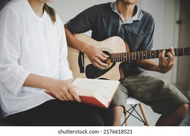  Christian Family Groups Praying With Holy Bible. And Play Guitar To Sing Worship Thanksgiving Praise, Reading Bible And Sharing The Gospel