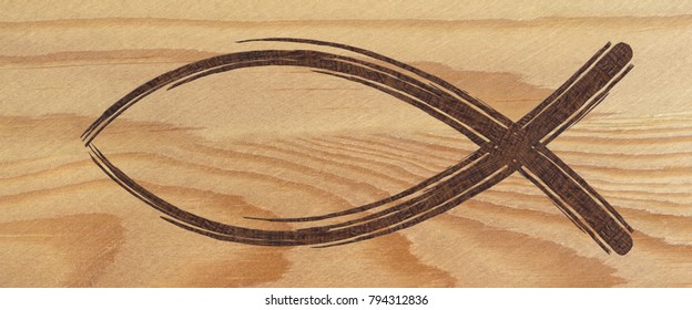 Christian fish symbol web banner on wood. Religious sign - Shutterstock ID 794312836