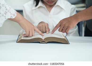 Christian Group Are Reading And Study Bible Together In Sunday School Class Room.
