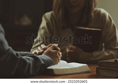 Christian groups hold hands to bless and pray for each other. comforting and praying together. Christians and Bible study Hope, faith, Christianity, and religion. sharing the gospel with a friend. 