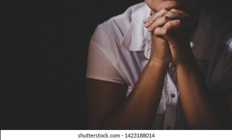 Christian life crisis prayer to god. Woman Pray for god blessing to wishing have a better life. woman hands praying to god with the bible. begging for forgiveness and believe in goodness. - Shutterstock ID 1423188014