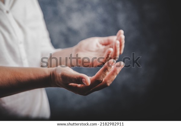 Christian life crisis prayer to god. Woman Pray
for god blessing to wishing have a better life. woman hands praying
to god with the bible. begging for forgiveness and believe in
goodness.