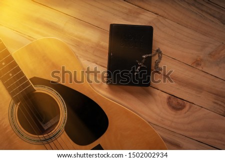 Christian man Bible study. Bible, books and guitar worship God. freedom. Worship of God that respects and loves our God. Christianity. religion