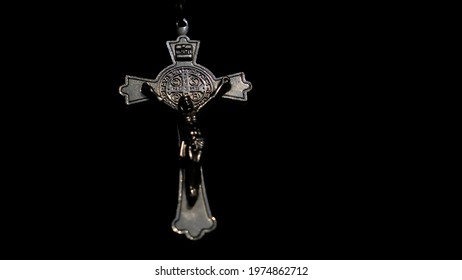 Christian Metal Cross Isolated On Black