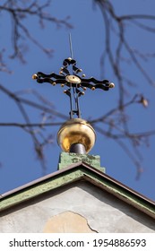 Christian Metal Cross On The Old Church On Sky Background.