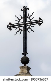 Christian Metal Cross On Sky Background.