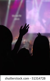 Christian Music Concert With Raised Hand