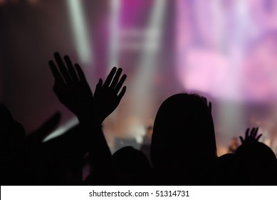 Christian Music Concert With Raised Hand