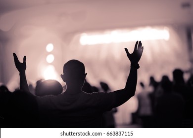 Christian Music Concert With Raised Hands