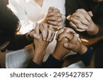 Christian and prayer. Christian group of people holding hands praying worships together to believe and Bible on a wooden table for devotional for prayer meeting concept.