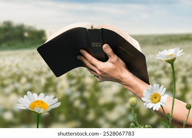 Christian praying with holy bible and flower background